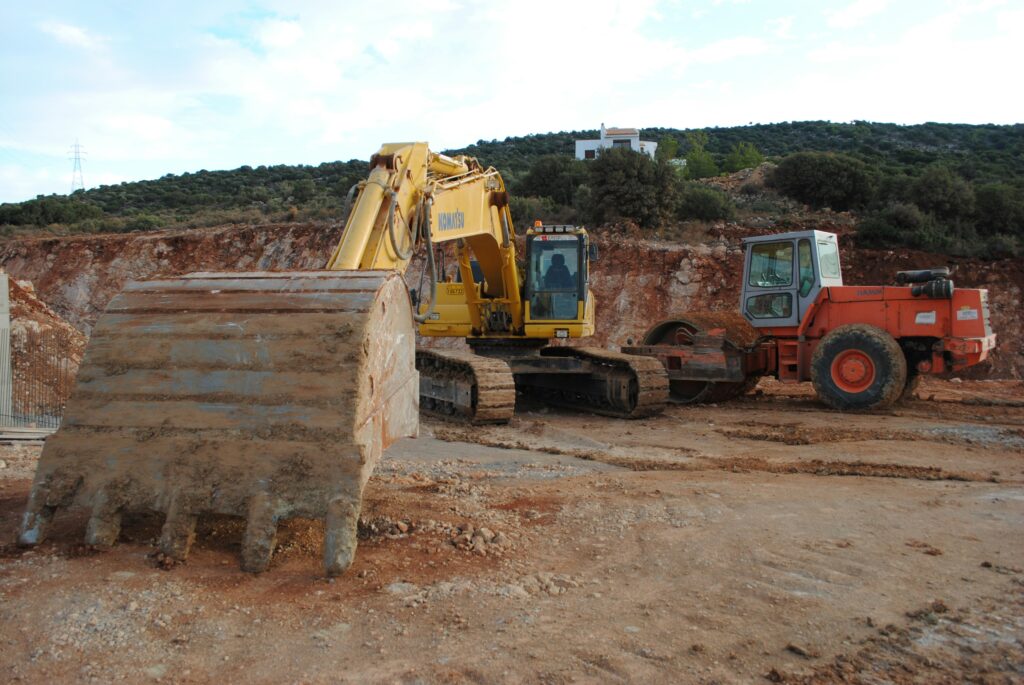 Construction site with excavation equipment highlighting the early stages of building development.